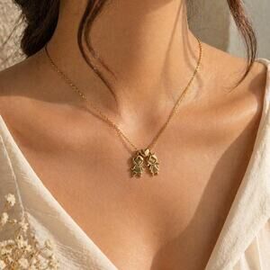Gold family necklace with boy an girls